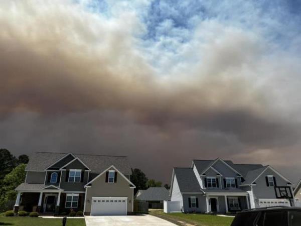 Wildfire smoke over NC coast.