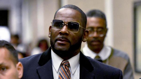 FILE - R. Kelly leaves the Daley Center after a hearing in his child support case May 8, 2019, in Chicago. According to federal officials Monday, April 24, 2023, singer R. Kelly was moved from a Chicago correctio<em></em>nal center to a medium-security prison in North Carolina last week. A federal judge in Chicago sentenced the 56-year-old Grammy Award-winning R&B singer in February to 20 years in prison for child pornography and enticement of minors for sex. (AP Photo/Matt Marton, File)