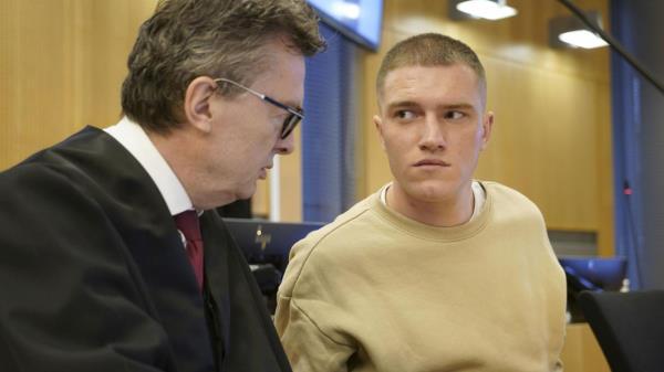 Former member of the Russian private military co<em></em>ntractor Wagner Group Andrey Medvedev, right, listens to his lawyer Brynjulf Risnes during a court hearing in Oslo, Tuesday, April 25, 2023. Medvedev, who is seeking asylum in Norway, was Tuesday facing a Norwegian court for a bar brawl earlier this year. Medvedev has co<em></em>nfessed to most of the charges for events in February and March but denies violence against police officers who handcuffed him outside an Oslo pub, the Norwegian news agency NTB said. (Gorm Kallestad/NTB Scanpix via AP)