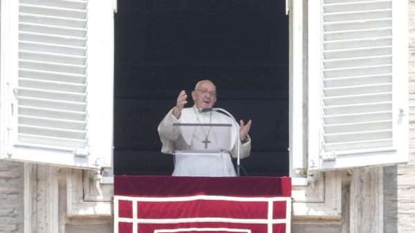 Pope Francis delivers the Regina Coeli noon prayer in St. Peter's Square at the Vatican, Sunday, May 21, 2023. (AP Photo/Gregorio Borgia)