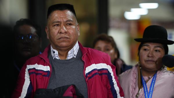 Former Jesuit Pedro Lima stops to talk to journalists after landing at El Alto internatio<em></em>nal airport in El Alto, Bolivia, Monday, May 22, 2023, before traveling to the capital La Paz to make a statement at the public prosecutors office related to a church pedophilia scandal. Lima denounced pedophilia by the late Spanish Jesuit Priest, Alfo<em></em>nso Pedrajas, and was expelled from the Society of Jesus in 2001. (AP Photo/Juan Karita)