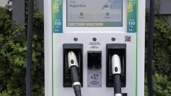 A charging station with Combined Charging System (CCS) plugs is seen in Anaheim, Calif., Friday, June 9, 2023. Owners of General Motors and Ford electric vehicles will be able charge at many of Tesla's large network of stations across the U.S. starting next year. (AP Photo/Jae C. Hong)