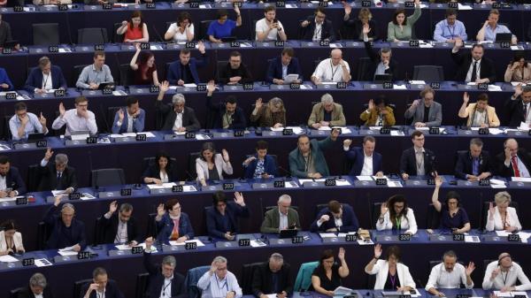 FILE - Lawmakers vote on the Artificial Intelligence act Wednesday, June 14, 2023 at the European Parliament in Strasbourg, eastern France. European Unio<em></em>n co<em></em>nsumer protection groups urged regulators on Tuesday, June 20, 2023, to investigate the type of artificial intelligence underpinning systems like ChatGPT, citing risks that leave people vulnerable and the delay before the bloc’s groundbreaking AI regulations take effect. (AP Photo/Jean-Francois Badias, File)