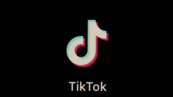 FILE - The icon for the video sharing TikTok app is seen on a smartphone, Tuesday, Feb. 28, 2023, in Marple Township, Pa. TikTok is killing off an in-app feature that was a close copy of the social media platform BeReal. TikTok said in a statement on Tuesday, June 27, that a notification was sent to users letting them know the feature would be discontinued. It said users could still access previous posts they made with TikTok Now. (AP Photo/Matt Slocum, File)