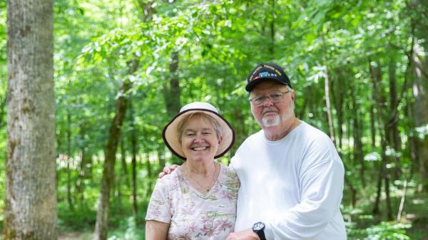 Debbie and Wayne Odom hike along the Oco<em></em>naluftee River Trail in Great Smoky Mountains Natio<em></em>nal Park in North Carolina, May 30, 2023. There are several U.S. parks that outdoor enthusiasts with disabilities can enjoy this summer. (Jessica Tezak/The New York Times)