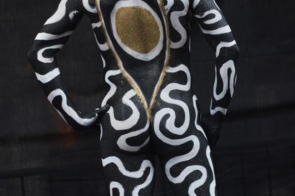 A model painted by an artist poses during Human Co<em></em>nnection Arts Annual NYC Bodypainting Day in Unio<em></em>n Square Park on Sunday, July 23, 2023, in New York. (AP Photo/Andres Kudacki)